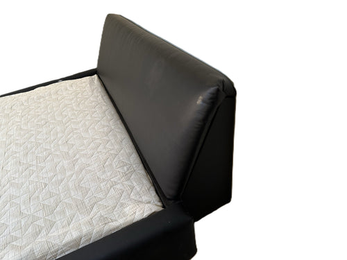 Photo of complete padded hardside waterbed with large angled situp headboard