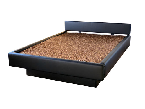 Photo of complete padded hardside waterbed black faux leather with flat headboard
